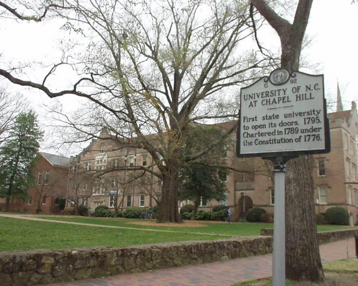 University of North Carolina at Chapel Hill campus with historical with sign - First state university to open its doors 1795. Chartered in 1795 under the Constitution of 1776.